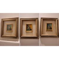 set di quadri con cornice dorata