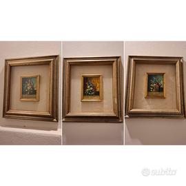 set di quadri con cornice dorata