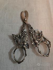 taglia uva in argento 800