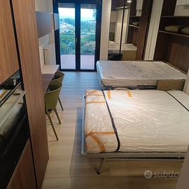 Monolocale con posto auto+terrazzo