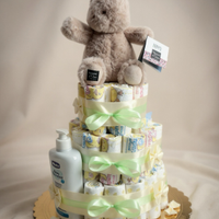 Torte di pannolini e torte con dolcetti per feste