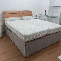 Struttura letto matrimoniale tenuto bene