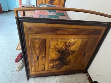 Letto singolo con sponde lavorate a mano