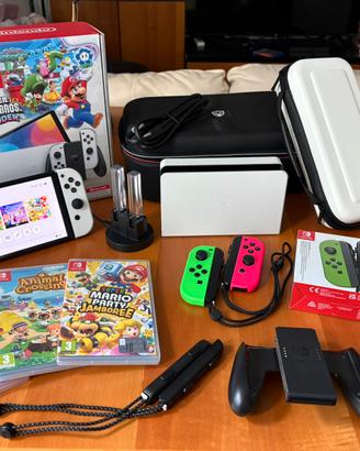 Nintendo Switch OLED+giochi+accessori – Come nuova