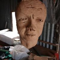 Antica testa in terracotta