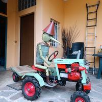 Trattorino con pinocchio e rimorchio fatto a mano