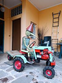Trattorino con pinocchio e rimorchio fatto a mano