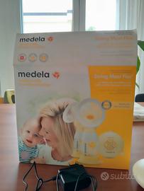Infanzia tira latte madela