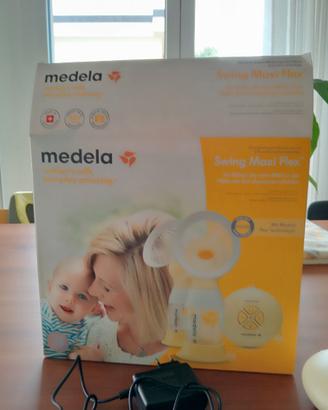 Infanzia tira latte madela