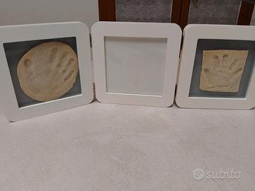 Cornice foto e impronte