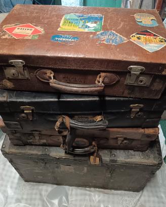 Set di valigie vintage e due bauli da viaggio 