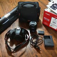 Canon EOS 250D con porta fotocamera e cavalletto 