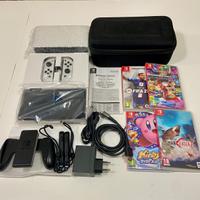 Nintendo Switch OLED + 4 giochi + custodia+vetro