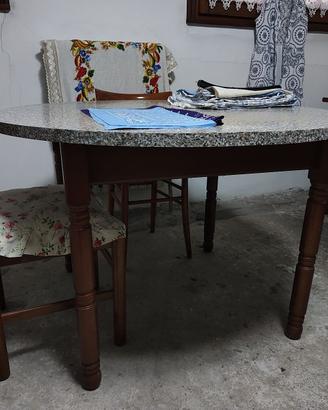 Tavolo rotondo allungabile e sedie