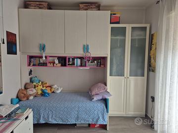 Armadio ponte con letto