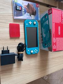 Nintendo Swich Lite Usata + 2 giochi + caricabat.