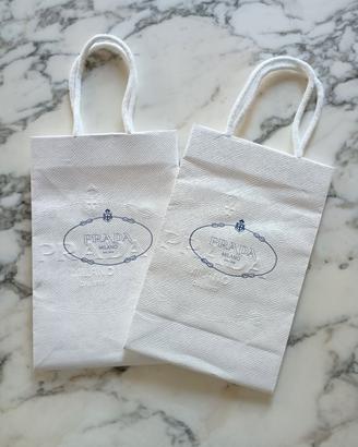 Coppia buste di carta / shopper Prada