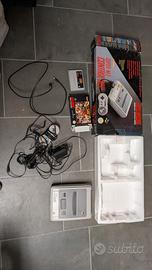 Super Nintendo con scatola e gioco