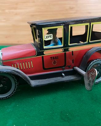 Riproduzione taxi vintage a carica in lamiera