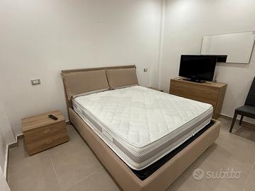 Camera da letto con trittico