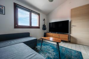 Trilocale con posto auto e ascensore