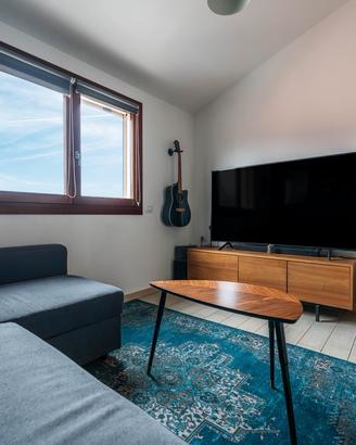 Trilocale con posto auto e ascensore