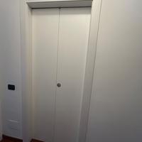 Porta a libro simmetrica