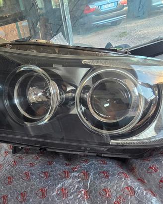 fanali anteriori bmw e91