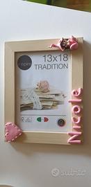 Cornice per foto da appendere.