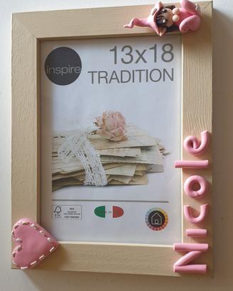 Cornice per foto da appendere.