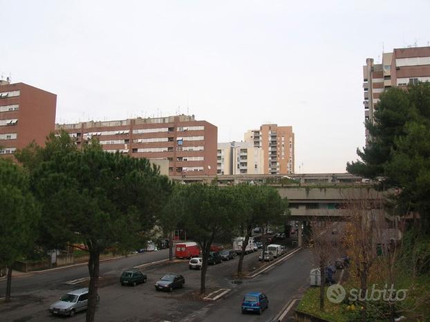 Quadrilocale con posto auto / Giuliano Dalmata