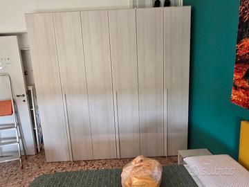 Camera da letto con soggiorno