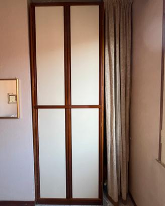 cameretta con armadio e letto singolo