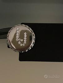 LIU JO spilla strass borsa giacca tappo etichetta