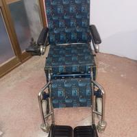 Sedia a rotelle per disabili con alzata surace