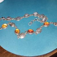 due bracciali in argento e ambre e pietre dure