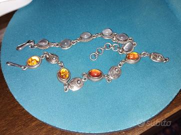 due bracciali in argento e ambre e pietre dure