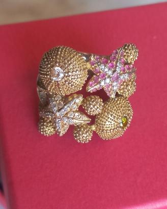 Anello con stelle marine e ricci in argento dorato