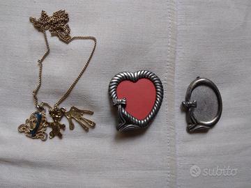 Portafoto e catenina in metallo, anni 80/90