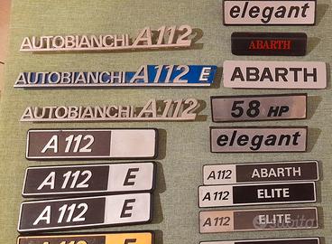 A 112 AUTOBIANCHI SCRITTE , FREGI , STEMMI , LOTTO