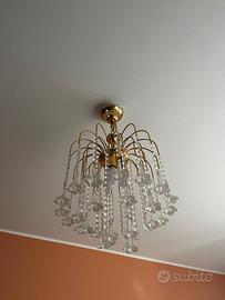 Lampadario in cristallo e 2 abat jour dorate