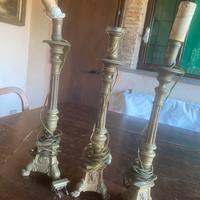 Tre  candelabri da chiesa in ottone :
