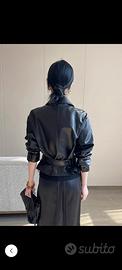 pantaloni divano cuscino cerniera giacca sedia 