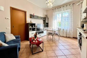 LUMINOSO BILOCALE CON POSTO AUTO