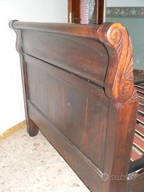 Letto in legno massiccio "A barca"