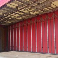 Cassone centinato con teli laterali scorrevoli