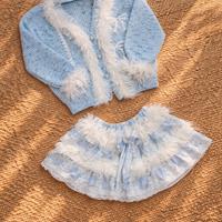 Set cardigan e gonna azzurro stile dolce