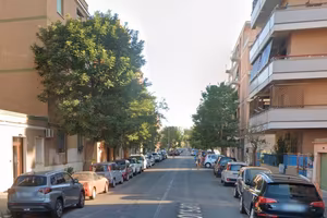 Ostia bilocale arredato