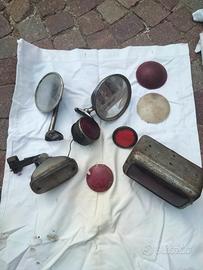 Specchietti e fanali antichi per macchine d'epoca 