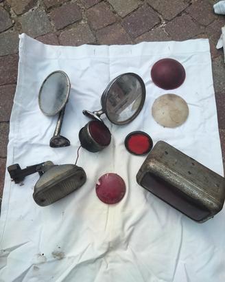 Specchietti e fanali antichi per macchine d'epoca 